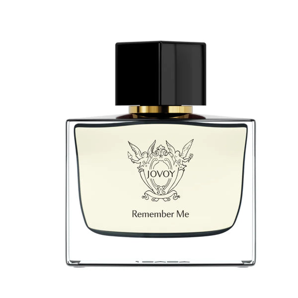 Jovoy - Remember Me Parfumflakon mit klarer Glasflasche, schwarzem Verschluss und filigranem Emblem vor weißem Hintergrund