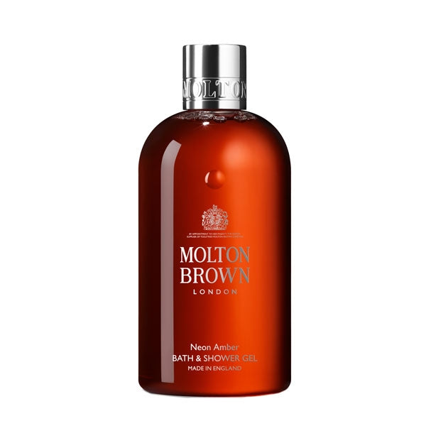 Molton Brown - Neon Amber - Bath & Shower Gel in bernsteinfarbener Flasche mit silbernem Verschluss und frischem Duftdesign